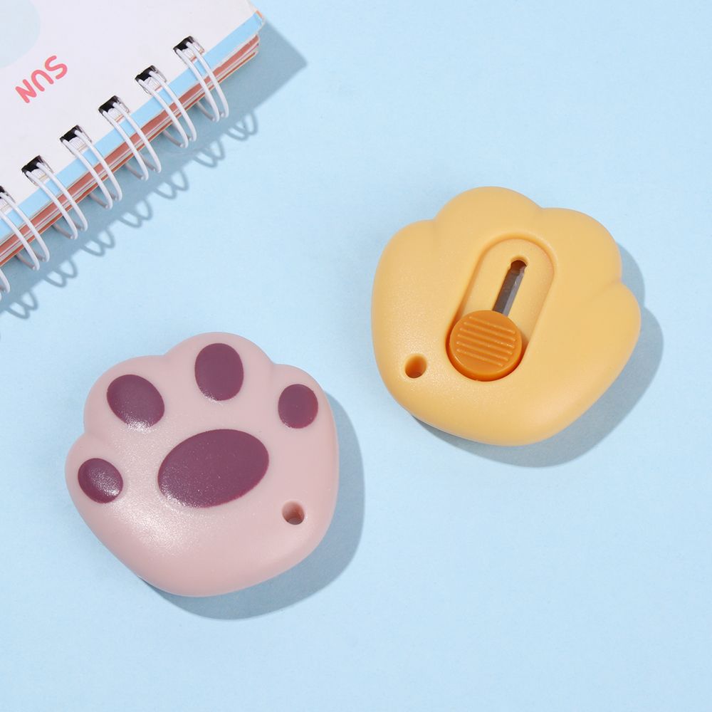 Mini cuchillo utilitario portátil con forma de pata de gato rosa, cortador retráctil, abridor de sobres, herramienta de corte de papel, suministros escolares y de oficina, 1 unidad