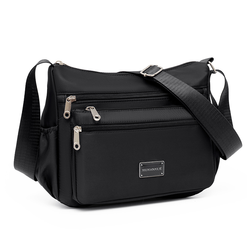 Taske dame skuldertaske med stor kapacitet vandtæt og slidstærk multi-lomme pendler fritid udendørs crossbody-taske: Sort