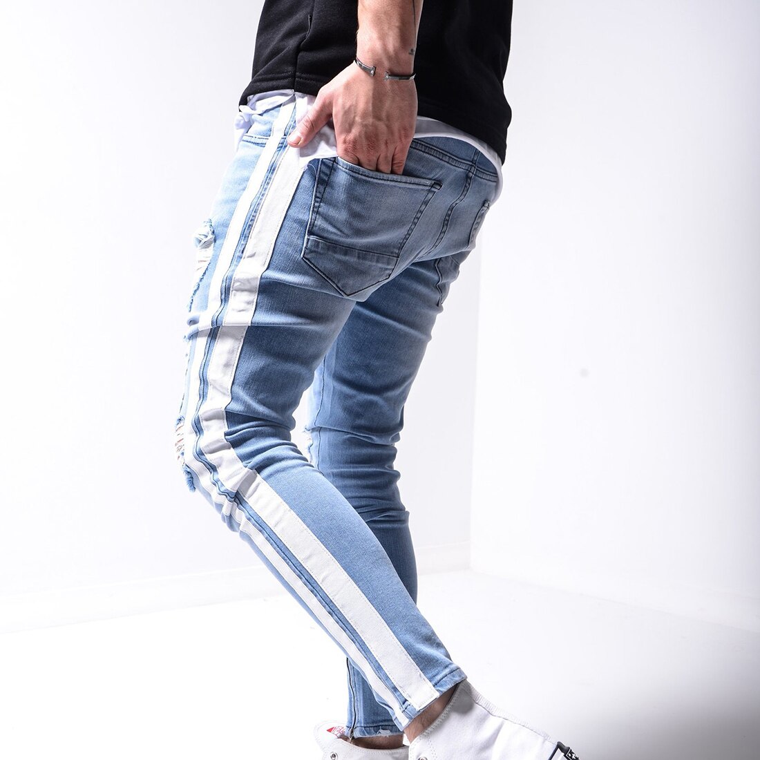 Pantalones pitillo rasgados para Hombre, pantalones vaqueros ajustados con rayas laterales para motociclista, pantalones vaqueros rasgados con agujeros estilo Hip Hop para Hombre