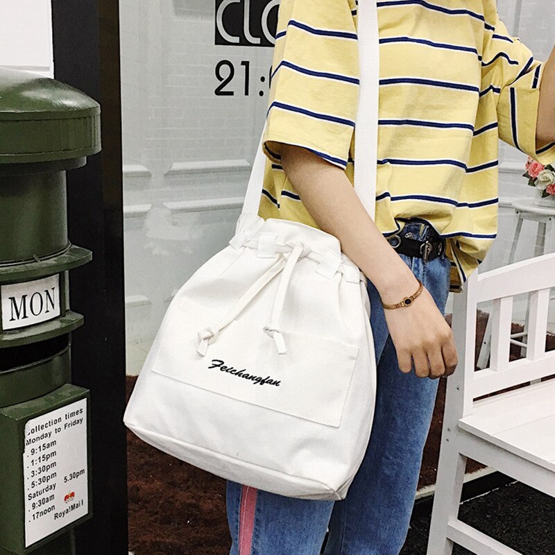 Nian lente en zomer koreaanse versie van de eenvoudige emmer canvas tas schouder laptop bulk tas messenger vrouw