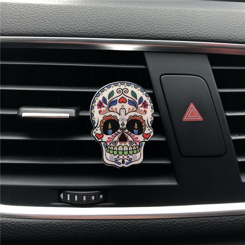 Ambientador de Clip de aire con cabeza de Calavera, accesorios de decoración montados en el aire acondicionado del coche, mejora el aroma de Perfume de aire, 1 unidad