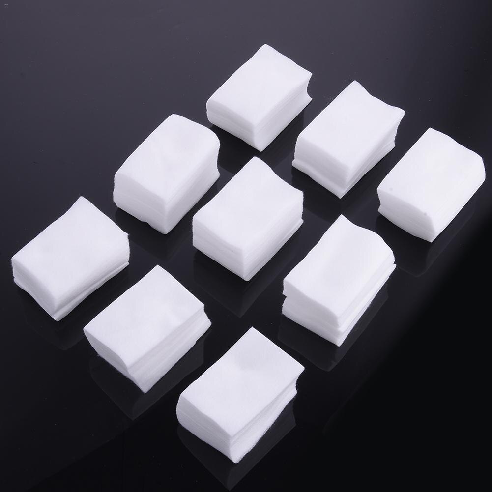 900 stuks / verpakking ontladingshanddoek wegwerp katoenen servetten voor nagels manicure tools polijsten gemakkelijk met opp verpakking