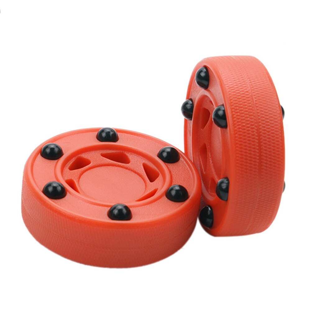 Perfekt ausbalancierter übungsrund-abs-hochdichte-rollhockeypuck, orange, langlebige anti-roll-zubehörräder