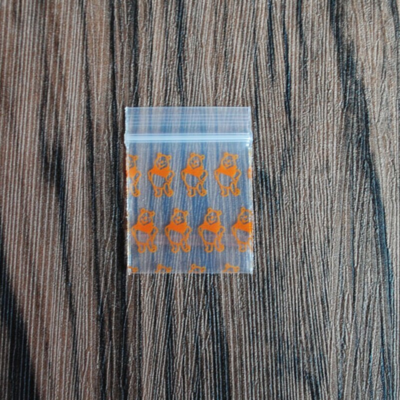 Billigare liten plastpåse med blixtlås ziplock-påse ziplock-pillerförpackningspåsar mer storlek mini zip-låspåsar plastförpackningspåsar: Orange björn