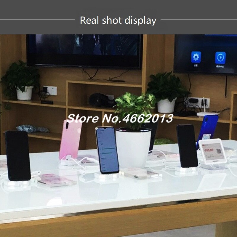 Soporte de seguridad para teléfono móvil iphone sistema antirrobo Burgar soporte de exhibición de alarma acrílico con Control remoto