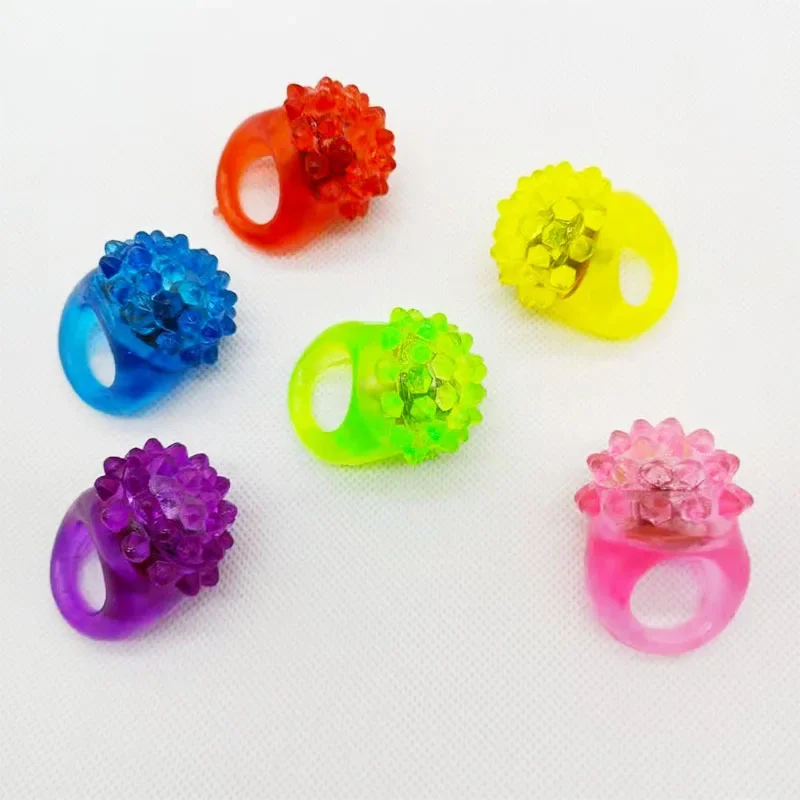 50pcs Light up Rings Bumpy Jelly Rubber Ring Glow Party Favor Finger Lights for Kids Birthday Party Christmas Halloween Festival: WHITE