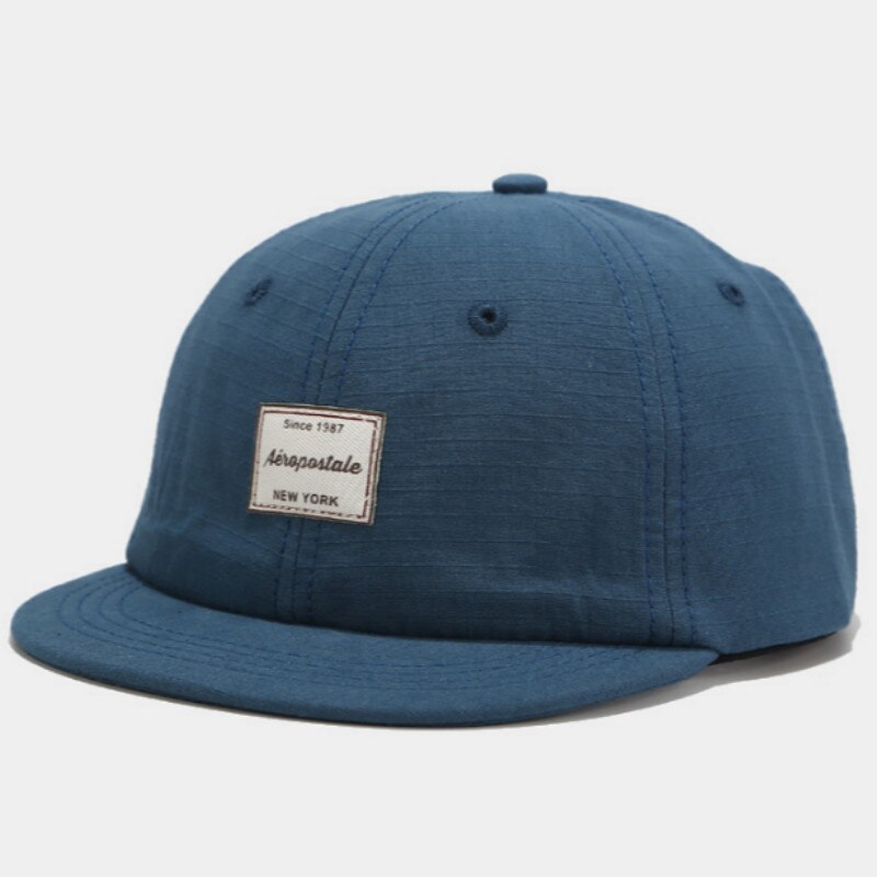 Kort ramme baseball lokk hofte hopp uformelt flat bremmet snapback hatt bomull utendørs sport hiphop menn lokk solkrem sommer lokk bein: Mørkeblå