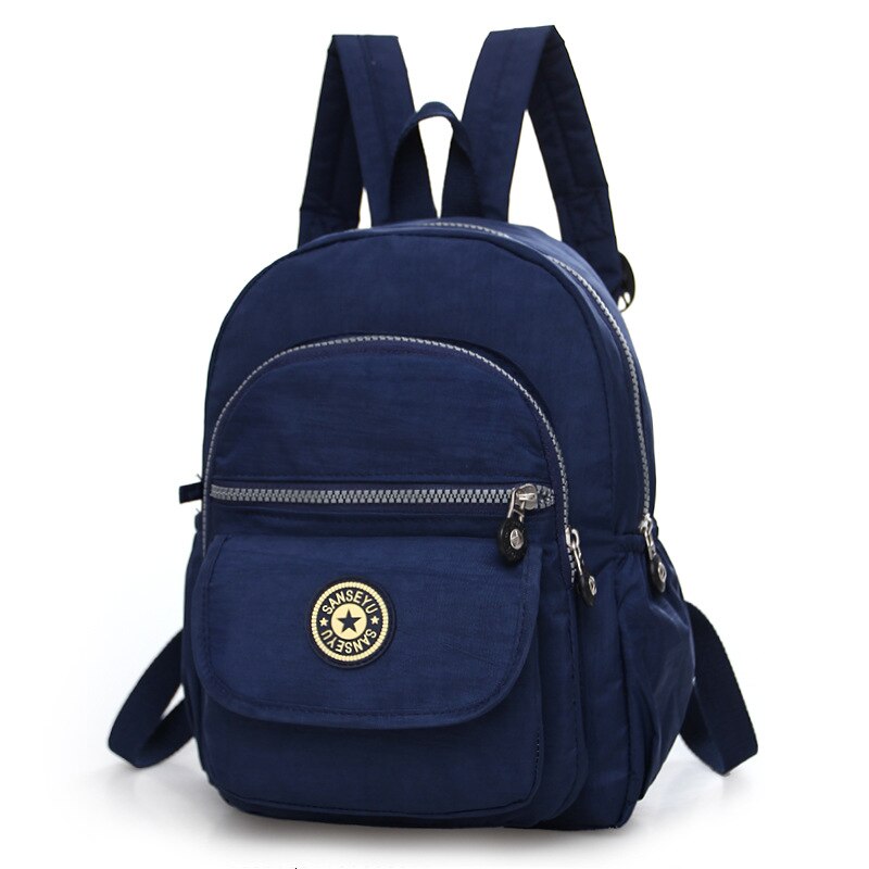 Kvinder nylon skole kvindelig rygsæk lille vandtæt rygsæk solid afslappet skuldertaske multifunktionelle skoletasker: Dyb blå