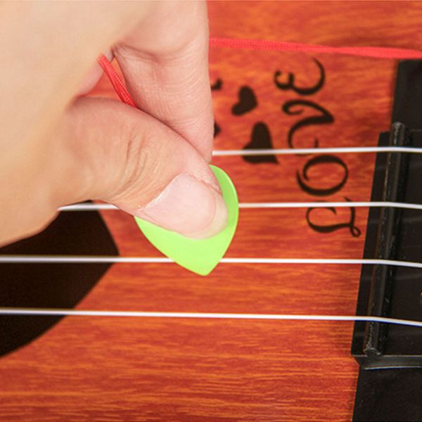 Musikinstrument mini ukulele børn guitar legetøj skole spille spil farve tilfældig
