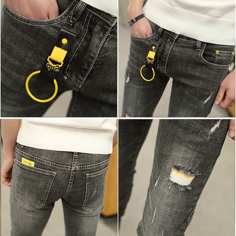 Trendiga män vår sommar koreanska tonåringar skinny stretch slitna skinny jeans män social spirit kille pennbyxor