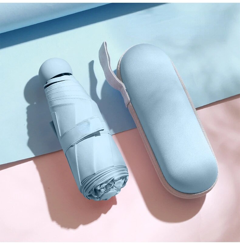 Kapsel Regenschirm klein und tragbar einfarbig Sonnenschirm für Frauen und Regen Dual-Use-Schutz: Blau