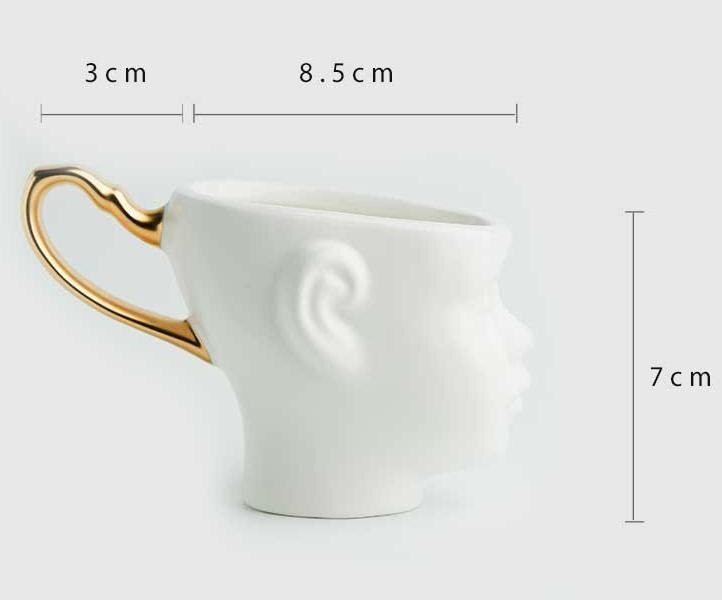 Ansiktsmugg par keramiskt guldmålat kaffekopp i nordisk stil: A