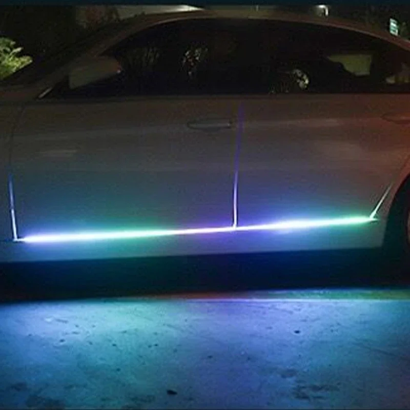 Luz ambiental que fluye Luz de la falda lateral del coche, tira de luz de desplazamiento, luz que fluye colorida con accesorios de luz de decoración de puerta: Grey / Color blanco cálido