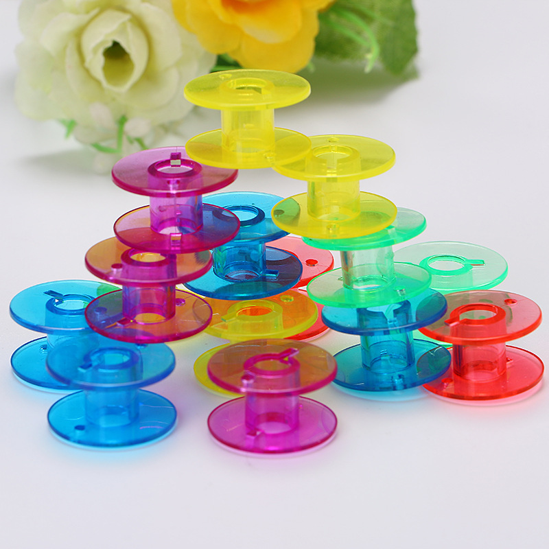 25 sztuk plastikowe szpulki do maszyn do szycia materiały krawieckie kolorowe przezroczyste plastikowe puste szpulki na szpulki schowek akcesoria krawieckie