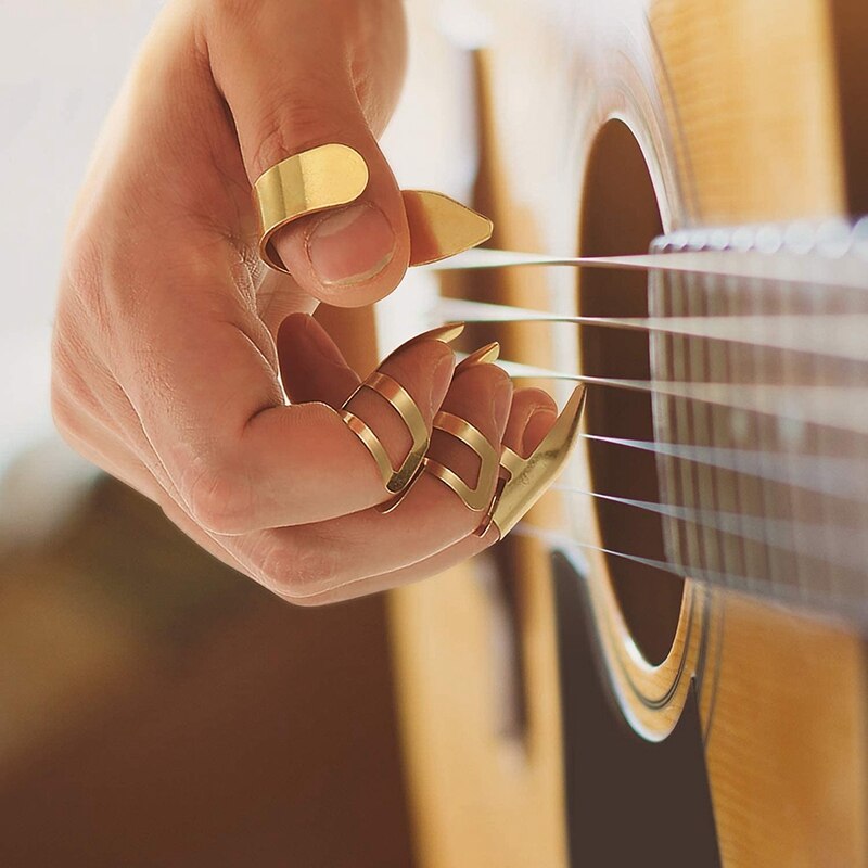 58 piezas púas de guitarra púas para pulgar púas de guitarra de Metal película protectora de la yema del dedo accesorios de guitarra de celuloide Kit con electrónica