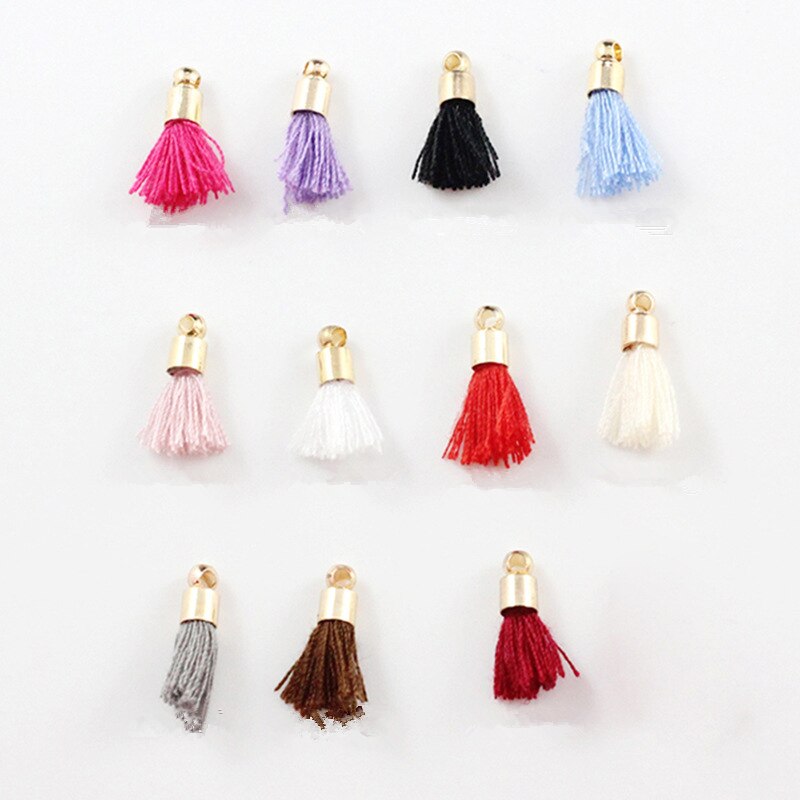10 st 1.5cm mini bomullstråd tofsar med hattar pysseltillbehör dekorativa smycken armband halsband nyckel mobiltelefon hänge