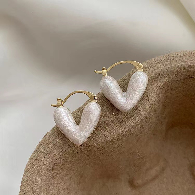Boucles d'oreilles asymétriques rondes creuses noires pour femmes, accessoires en strass pour femmes: En laiton Plaqué