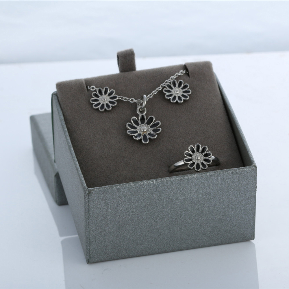 earrings necklace and rings set in stainless steel jewelry