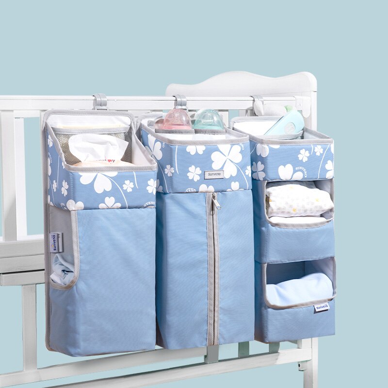 Sunveno Crib Organizer for Baby Crib Hanging Storage Bag Baby Clothing Caddy Organizer for Essentials Bedding Diaper Nappy Bag: Clover blue L