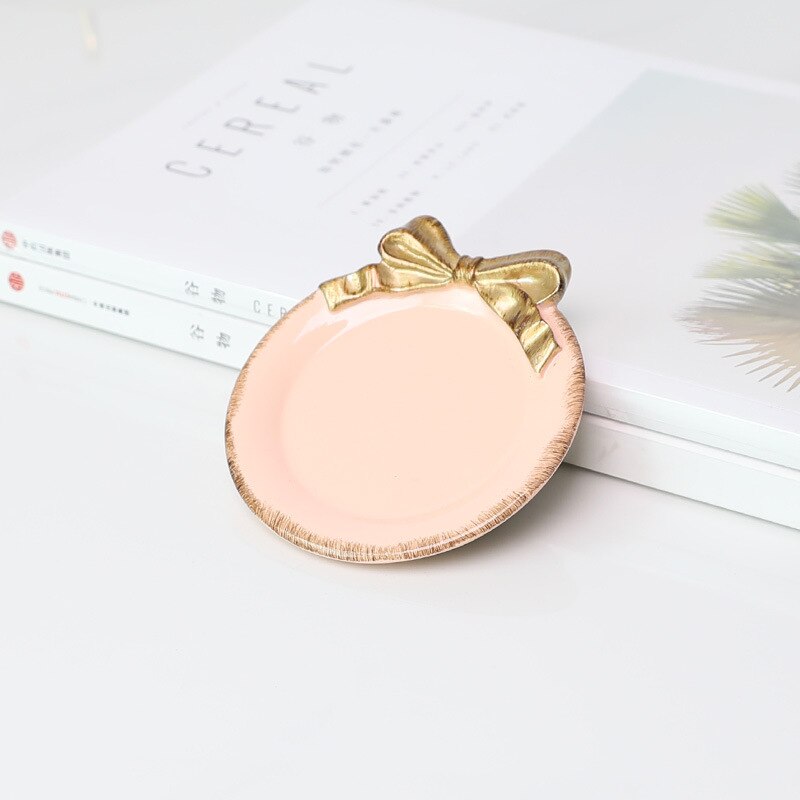 Kreative Harz Platte SchöNe retro Gold Überzogene Bogen-knoten aufbringen Nachtisch Obst Kuchen Platten Lagerung Tabletts Hause Dekoration 1Stck: Rosa runden