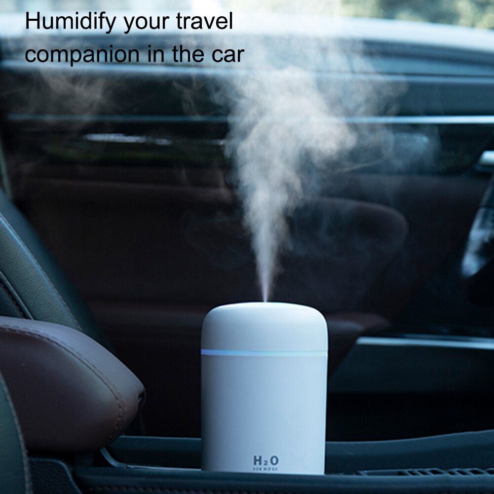 Humidificador de niebla de coche USB 300ml Mini purificador de aire 7 colores LED luz de noche ambientador ajustable portátil para el escritorio del hogar del coche