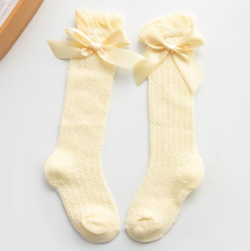 Barn flickor kunglig stil rosett knähöga nätstrumpor.baby toddler bowknot in tube socks.kid ihåliga strumpor sox 0-4y: Gul rosett / 2y-4y