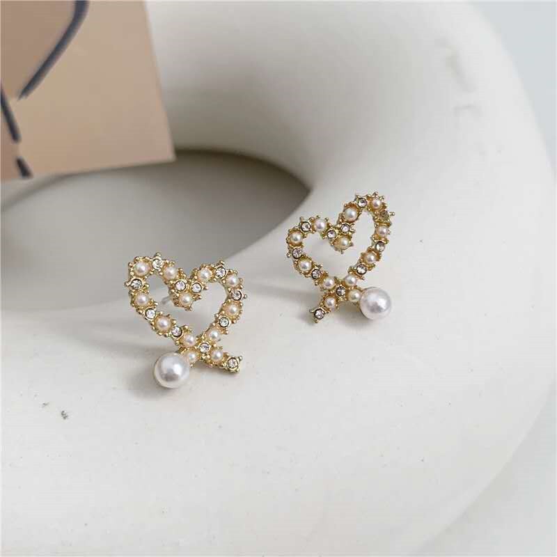S Needle Korea Irregular Hollow Love Pearl Earrings Compact Joker Love Earrings Female