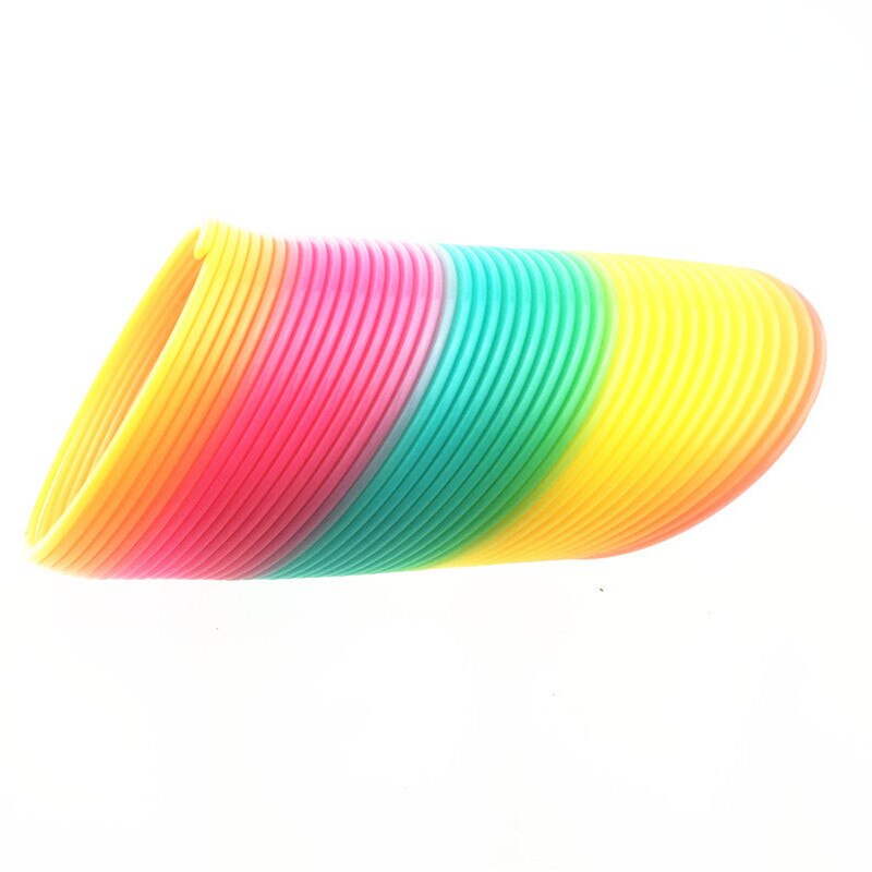 Stor størrelse 10cm børn magisk plast regnbue forår farverige børn cirkel spole elastisk ring til julefødselsdag