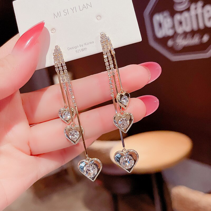 Lange metalen oorbellen met koreaanse jokermotief, schattige hartvormige oorbellen voor dames