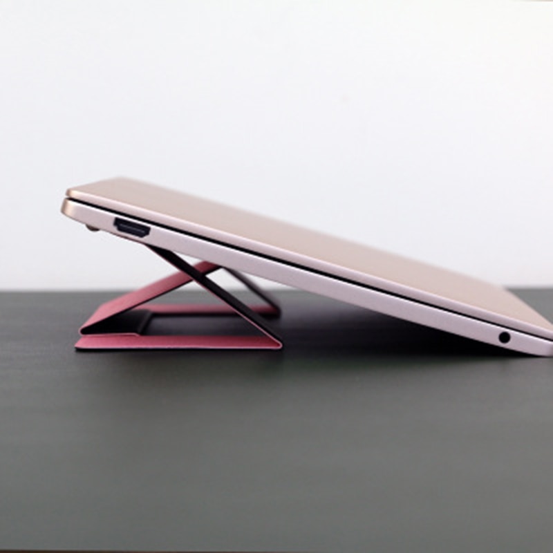 MOFT provides an instant-adjustable stand for your laptop, pad adhesive invisible folding portable stand for iPad MacBook laptop