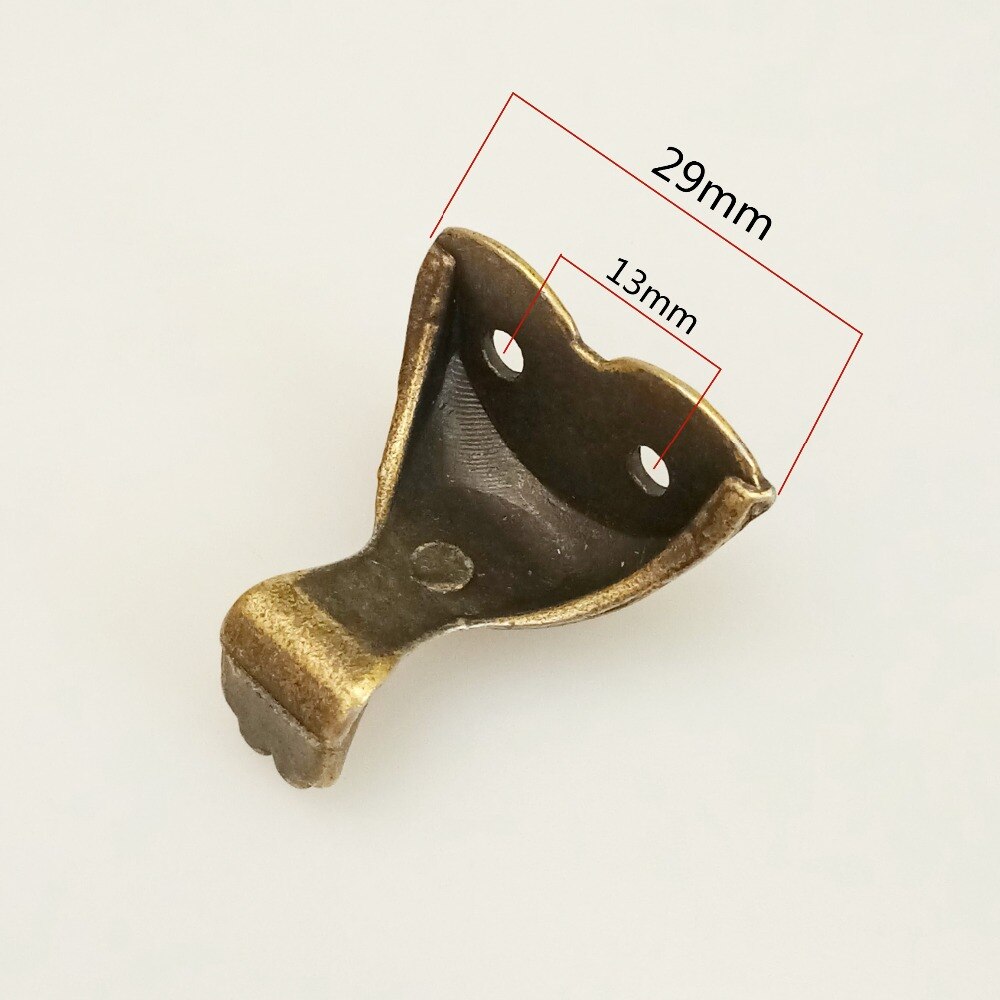4 st antik fot mässing smycken trälåda dekorativa fötter ben hörnfäste skåpskydd för möbelbeslag 28 x 27mm
