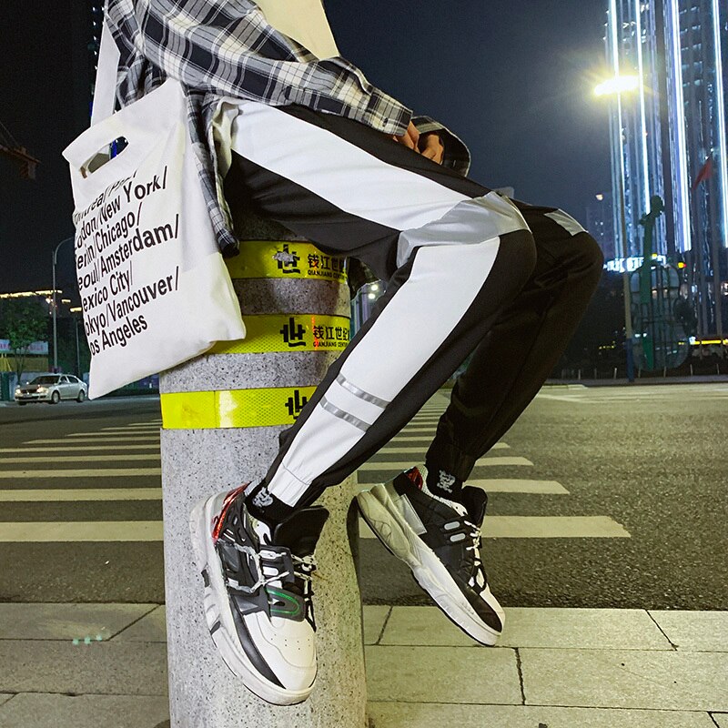 Hombre collegehousut polyesteri spandex heijastavat valoa trendikuvio vapaa-ajan housut streetwear hip hop musta