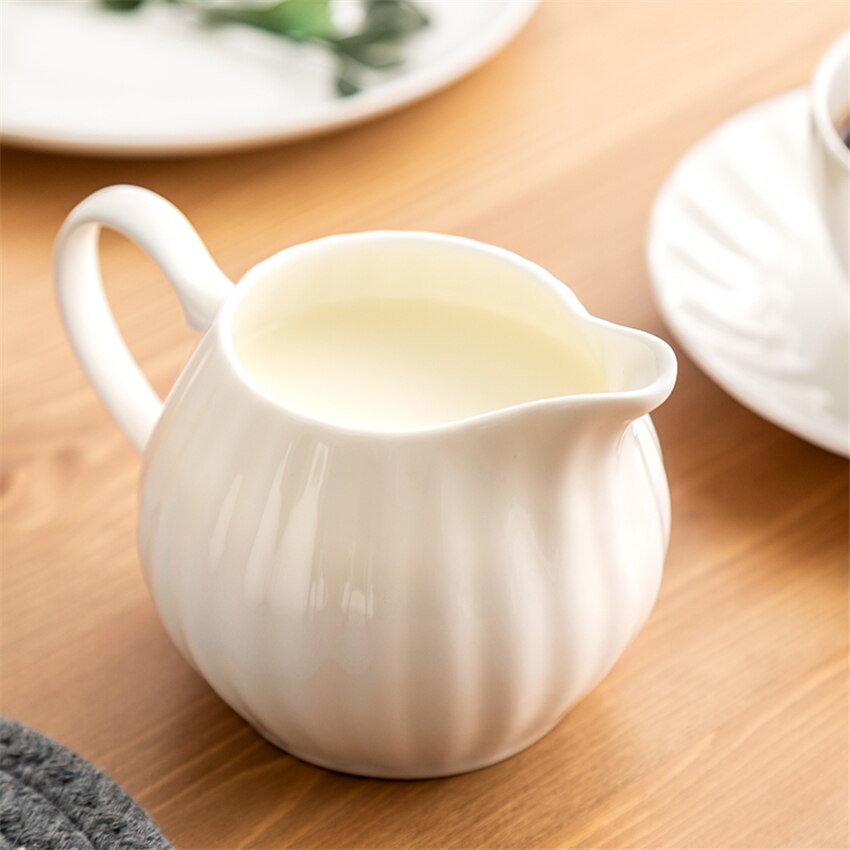 Taza de cerámica spigot, taza de café, leche, pequeño tanque de leche, taza de leche, hueso de flor, china, alivio británico, aparato para café a juego