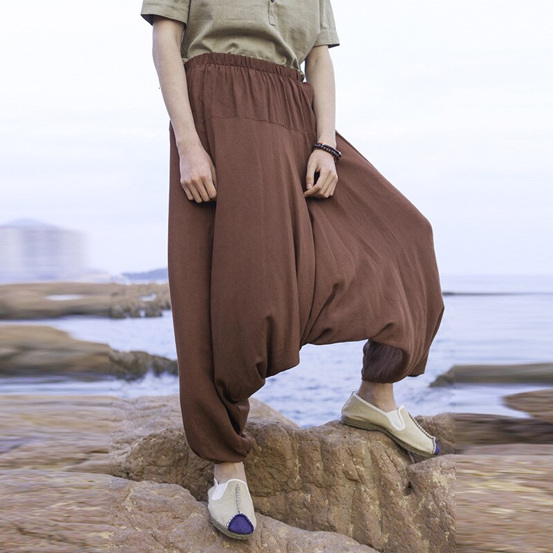 Kung Fu orientalne spodnie Hakama tradycyjna chińska odzież dla mężczyzn Wushu lniane szerokie nogawki luźne spodnie męskie skrzydła Chun kostiumy