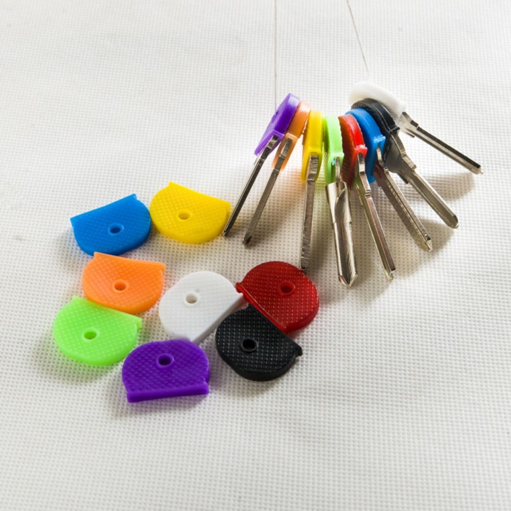 12 Uds. Accesorios para llaves, cerraduras suaves de goma Multicolor huecas, tapas para llaves, cubiertas de silicona, adornos para llaves, cubierta para llavero, Protector para llaves