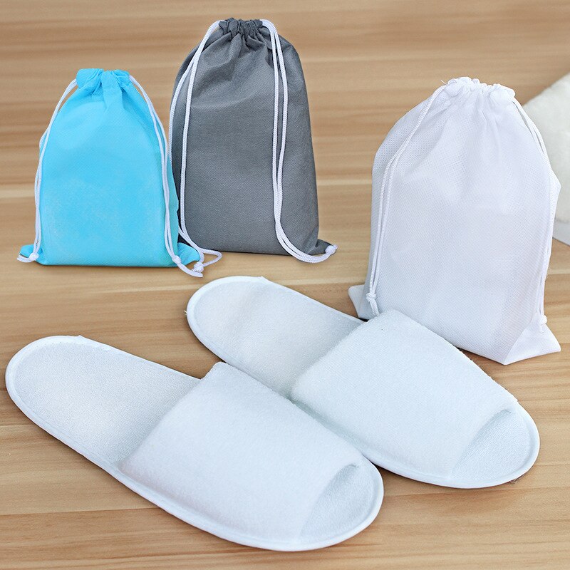 Zapatillas plegables desechables para hombre, zapatos de viaje de negocios, Hotel, Club, portátiles, con bolsa, lote de 10 pares