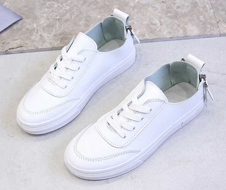 Kvinnor fritidsskor bekväma vita nude sneakers snörning delat läder flickor casual dragkedja plattor skor