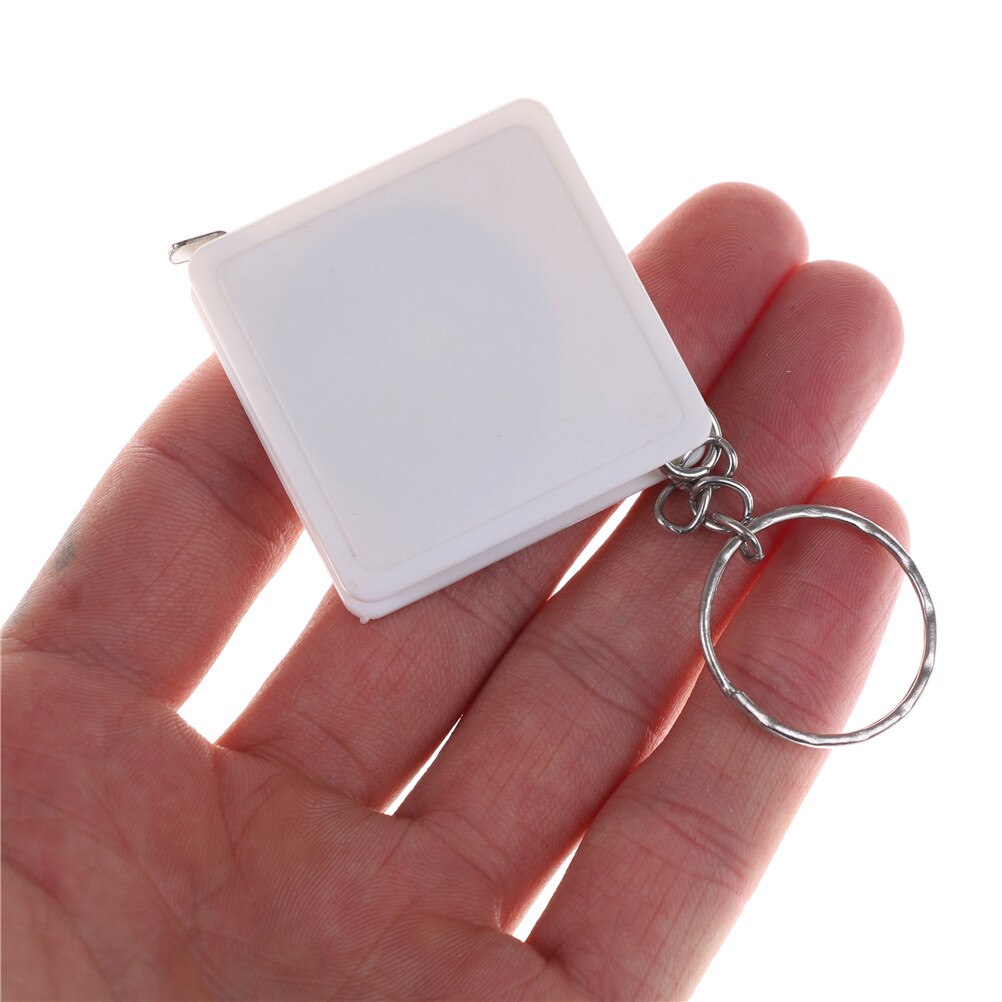 Mini rolmaat met sleutelhanger plastic draagbare intrekbare liniaal centimeter/inch rolmaat 1 meter