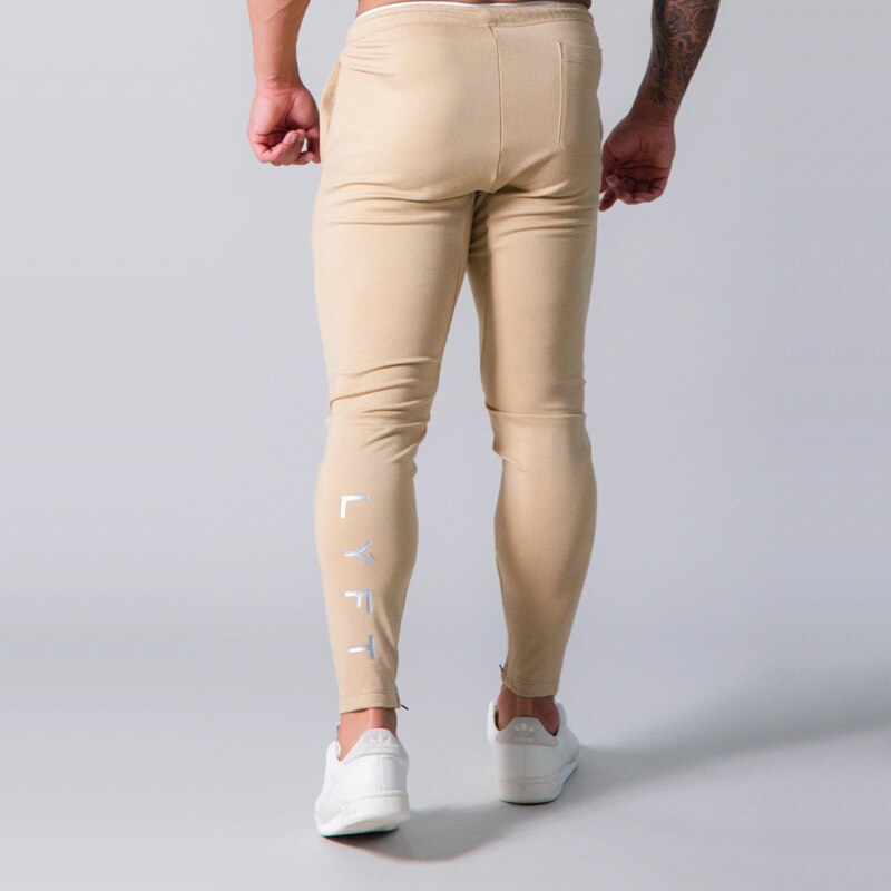 Pants men's jogging fitness track pants men's Korean casual slim hit color jogging trousers: XXXL / Khaki