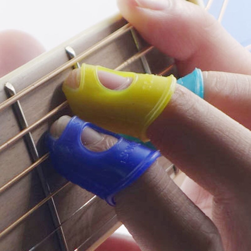 5 stk / sæt mix farve guitar tommelfinger pick fingre cap beskytte fingre til splejsning linje presning elastisk silikone ukulele finger hat