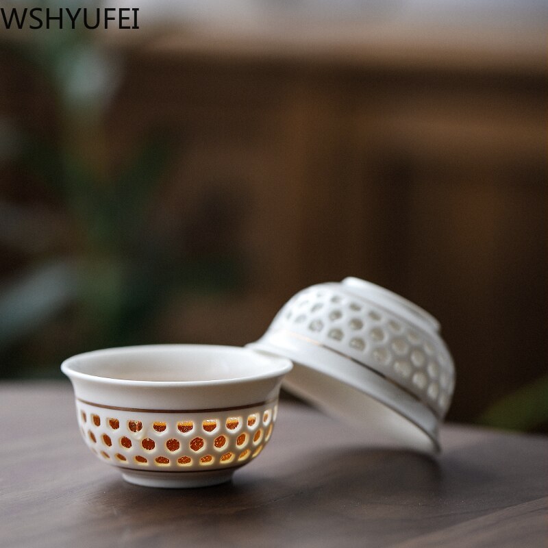 A set of white porcelain Tea set tea set home hollow hollow cellling tea set a whole set of household ceramic tea set