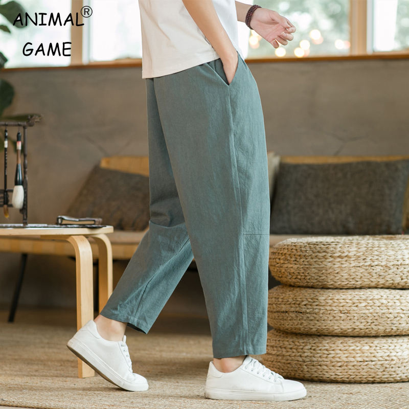 Miesten housut, puuvillaiset pellavahousut, yksivärinen, hengittävät, väljät shortsit, suorat kiristysnyörilliset housut, streetwear-housut