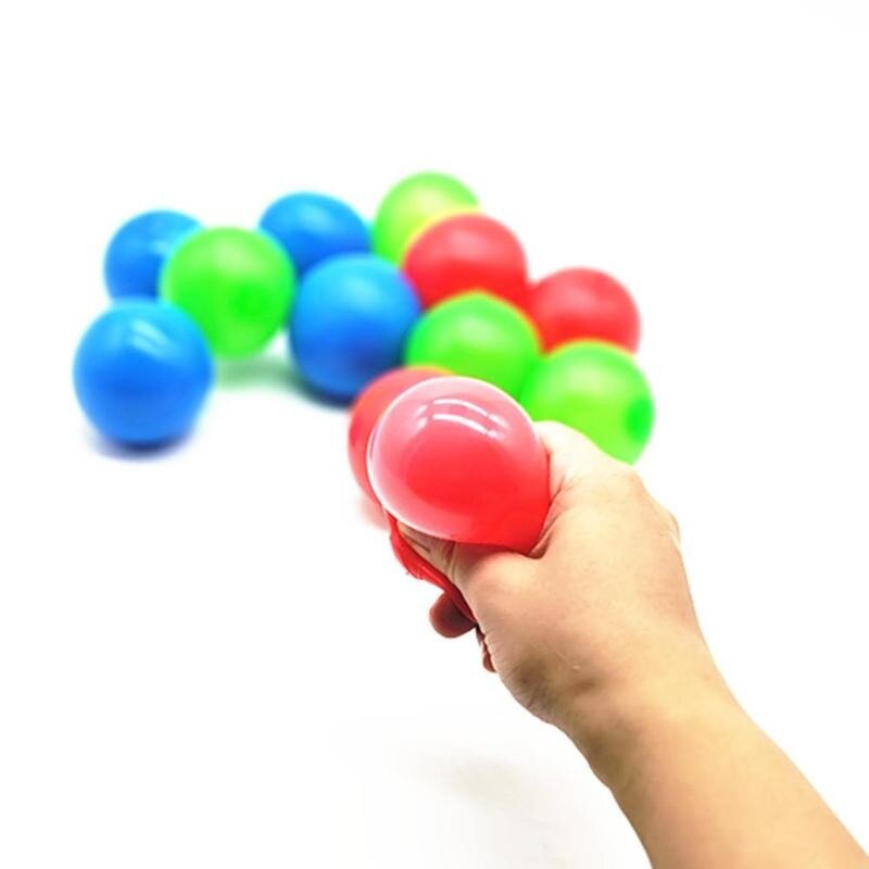 Pelota de descompresión TPR, pelota de Squash pegajosa, juguete brillante para niños, Bola de pared adhesiva, 1 Uds.