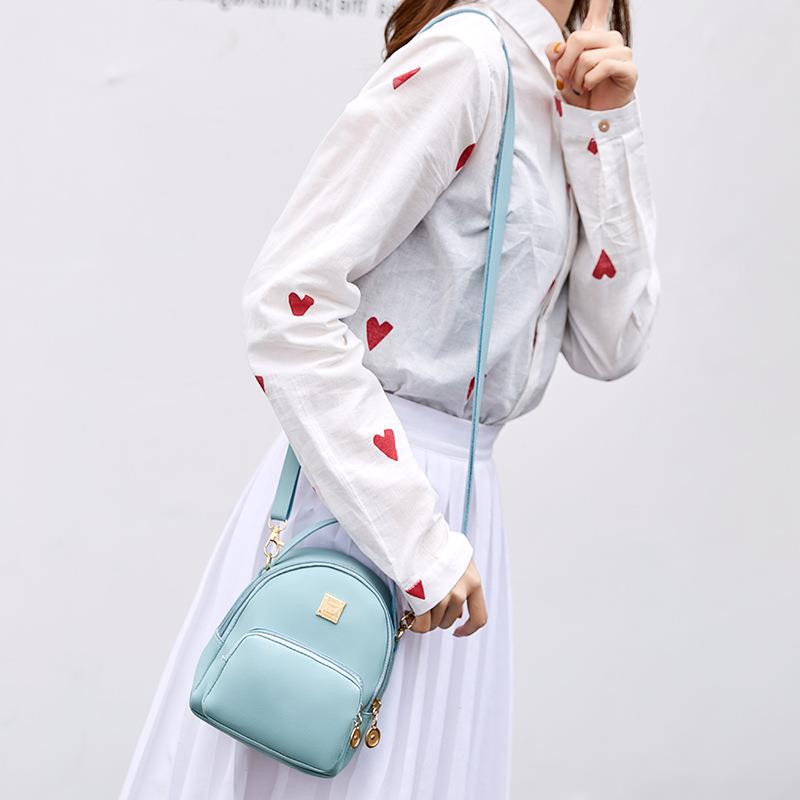 NIGEDU mini sac à bandoulière pour femmes dames sacs à main cuir PU bonbons couleurs forme populaire filles sac à bandoulière sac à dos noir