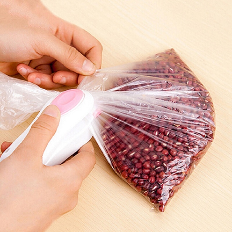 Bärbara påsklämmor handhållna mini elektrisk värmeförseglingsmaskin impulsförseglare tätningspackning plastpåse arbete 6 färger