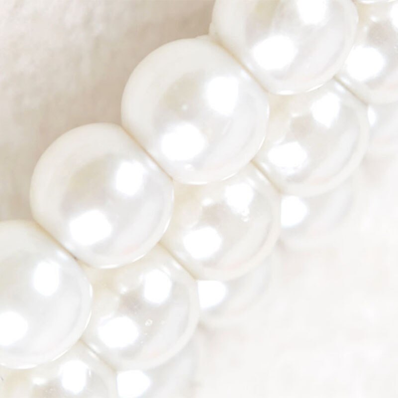Pack de 3 perchas elegantes de plástico con perlas blancas a la para niños y mascotas.