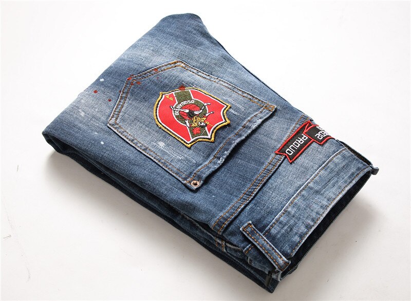 Bekende merken heren slim jeans gescheurde jeans voor mannen kleine stretch verf badge broek herenkleding hiphop streetwear blauw