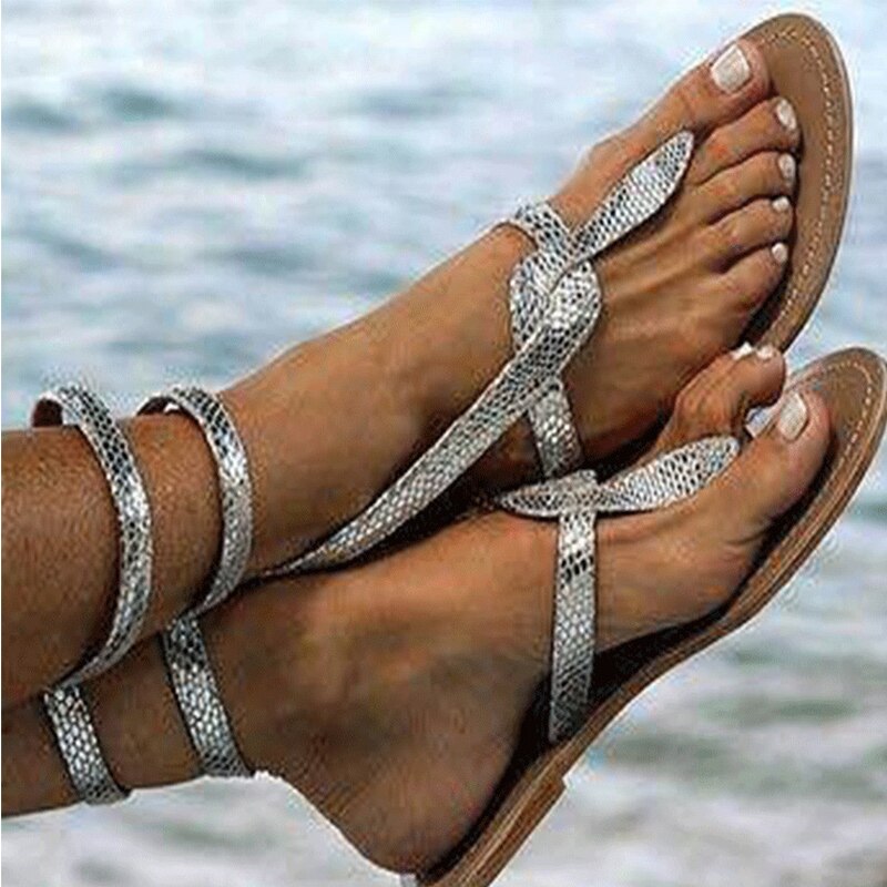 Femmes gladiateur sandales femme serpent modèle chaussures femme tongs plates dames croix liée plage chaussures grande taille