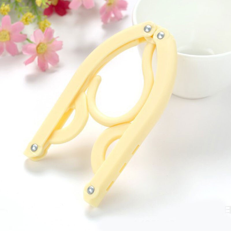 Cintre pliable de voyage multifonction | Support de séchage Portable en plastique, magique, couleur unie, permettant de gagner de l'espace, fournitures de voyage: YELLOW