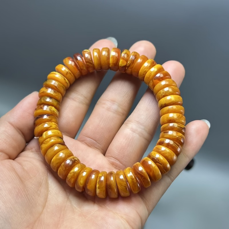 Amber bijenwas kralenarmband, enkele ringaccessoires voor heren en dames